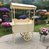 wood candy cart, design this cart in flower garden party real Children taking cupcakes from the cart