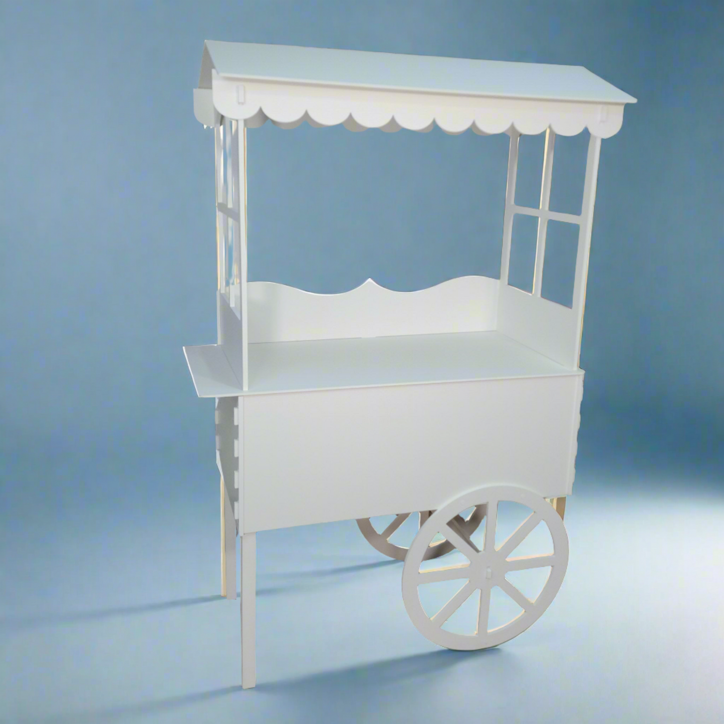 Chariot à bonbons sur roues avec toit blanc à vendre