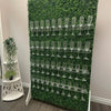 Grass wall champagne wall, drink holder for bridal showers and weddings, champagne wall for birthdays, grass wall backdrop with drink holders image.