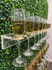 Grass wall champagne wall, drink holder for bridal showers and weddings, champagne wall for birthdays, grass wall backdrop with drink holders image.