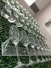 Grass drink wall, grass champagne wall, drink holder for bridal showers and weddings, champagne wall for birthdays, grass wall backdrop with drink holders image.